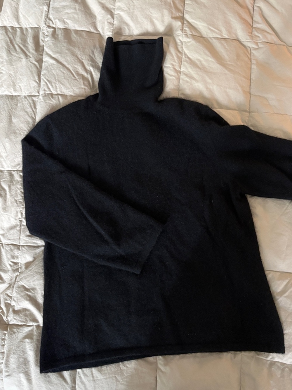Soft black cashmere turtleneck sweater